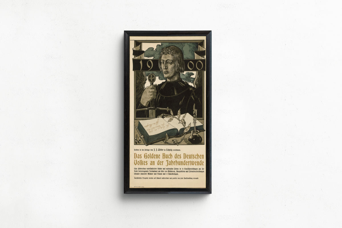 Framed art print of Das Goldene Buch des Deutschen Volkes an der Jahrhundertwende by Joseph Sattler, in a slim black frame on a plain white wall