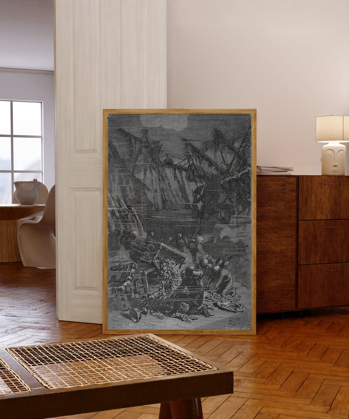 Framed art print of De ces caisses s'échappaient des lingots… by Alphonse de Neuville, in a light wood frame leaning in a warm room with a parquet floor