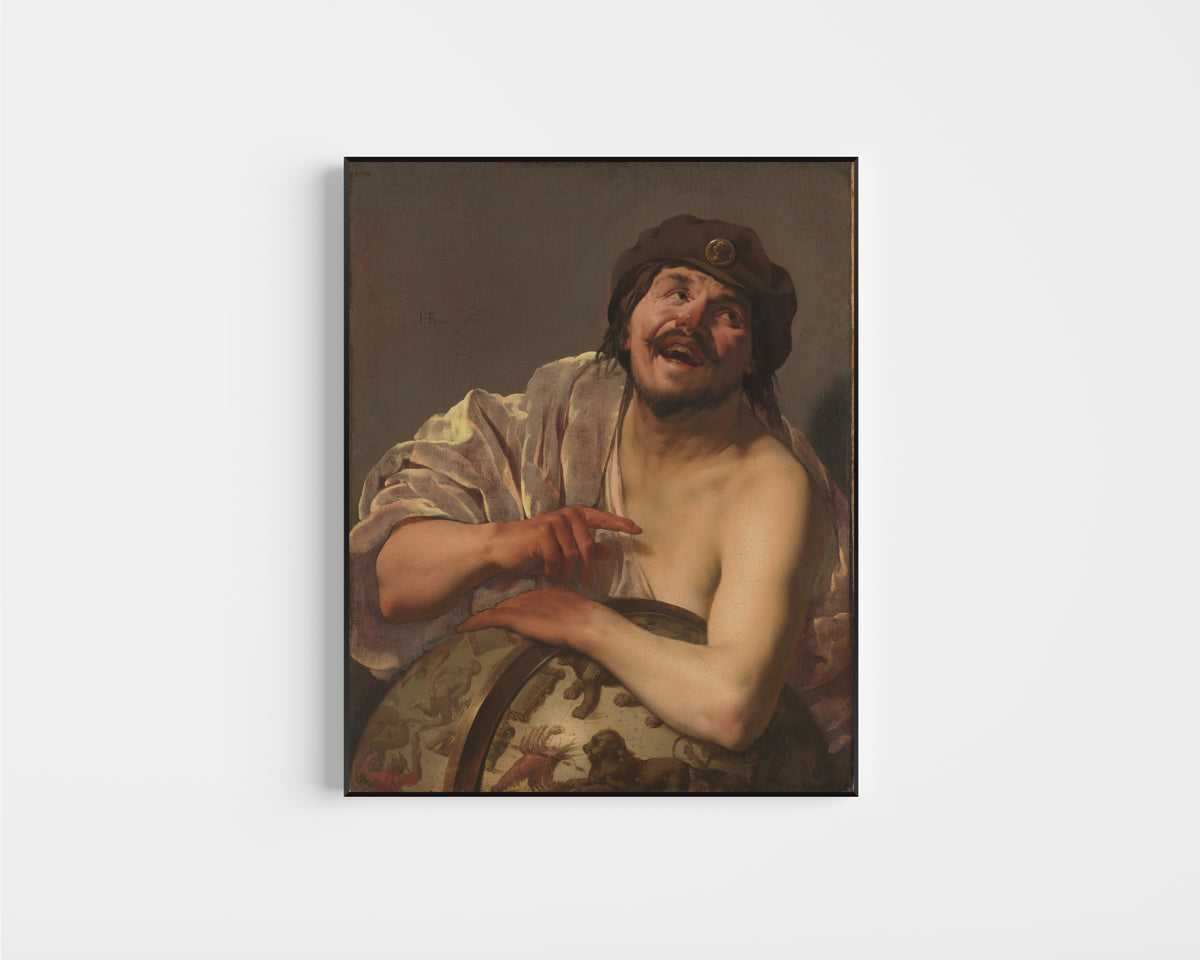 Framed art print of Democritus by Hendrick ter Brugghen, in a slim black frame on a plain white wall