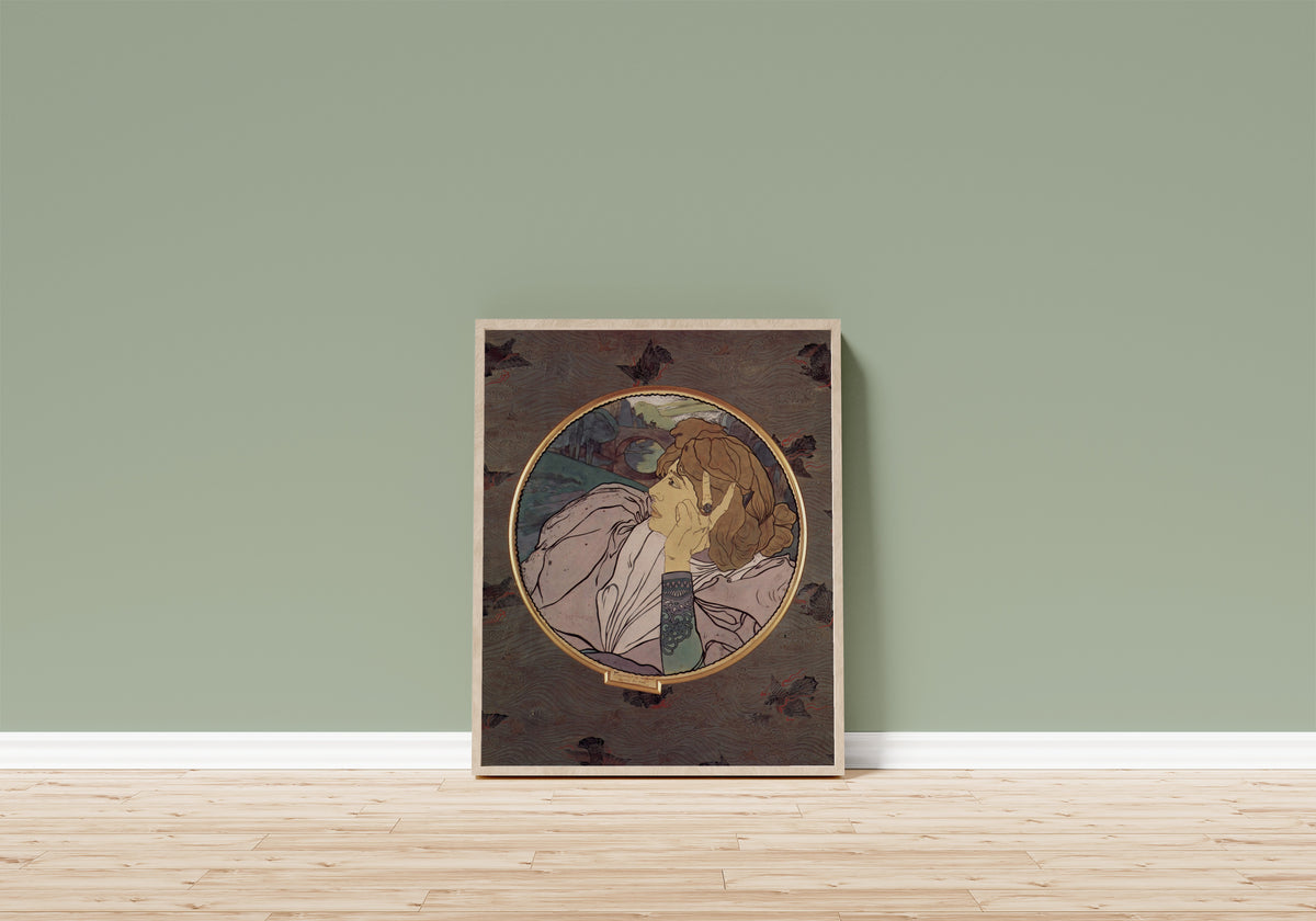 Framed art print of Die Stimme des Bösen oder Melancholie (Tondo) by Georges de Feure, in a light wood frame leaning on a sage green wall above a wooden floor