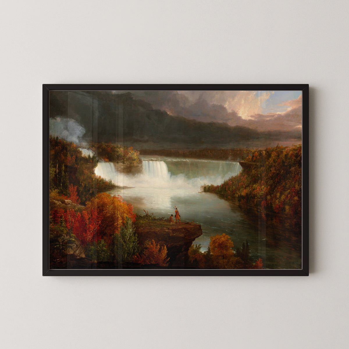 Distant View of Niagara Falls by Thomas Cole — in a black frame on a pale wall