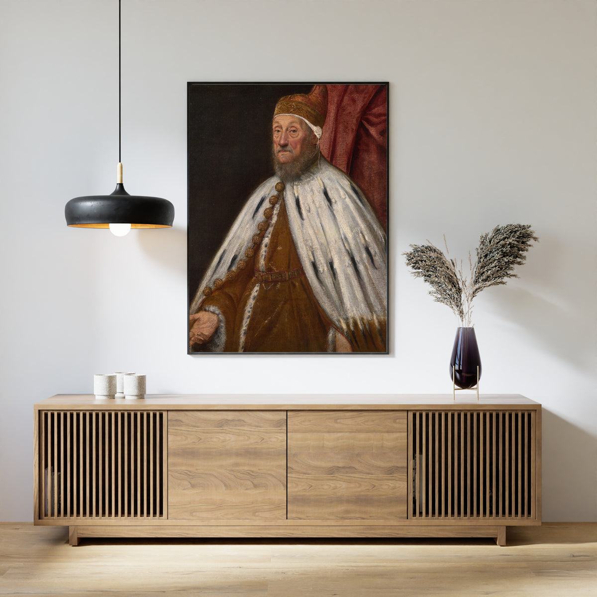 Framed art print of Doge Pietro Loredano by Tintoretto, above a slatted wood sideboard