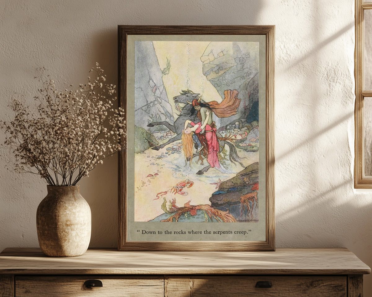 Framed art print of Down to the rocks where the serpents creep. by Warwick Goble, in a dark wood frame leaning on a rustic console beside dried flowers