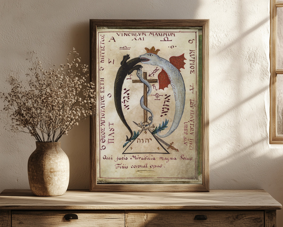 Framed art print of Dragon Devouring a Lizard, from Cyprianus by Unknown artist, in a dark wood frame leaning on a rustic console beside dried flowers