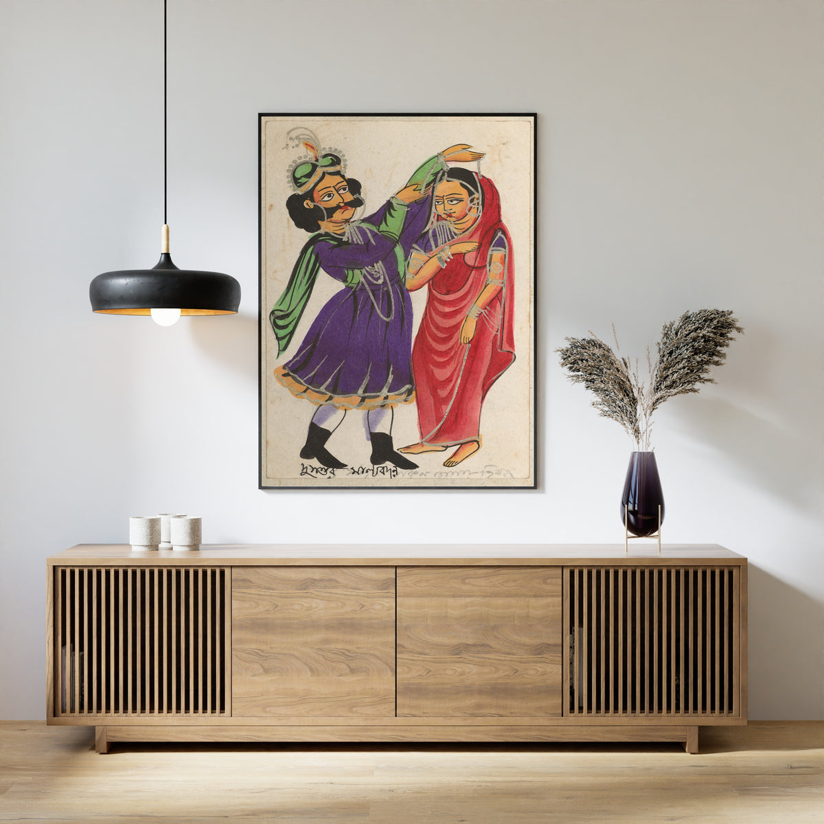 Framed art print of Dusmanta Garlanding Shakumtala by Kalighat painter, above a slatted wood sideboard