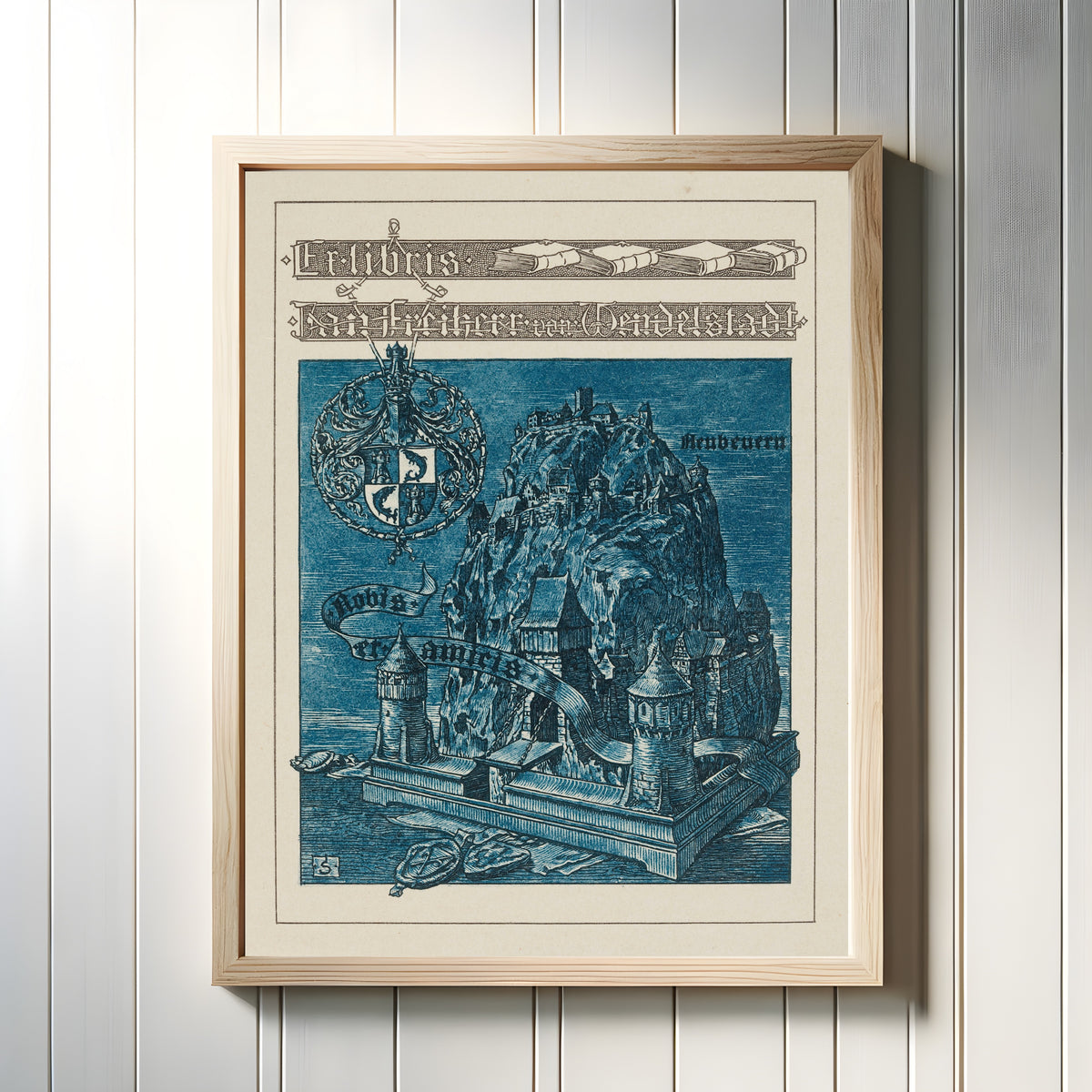 Framed art print of Ex Libris Jan Freiherr von Wendelstadt by Joseph Sattler, in a light wood frame on a white panelled wall