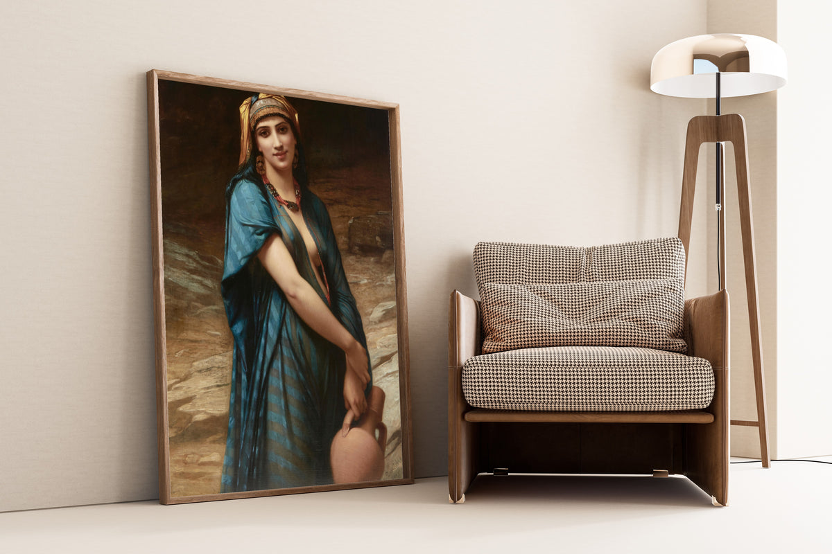Fetching Water by Charles Landelle — framed and leaning against a wall beside an armchair and a floor lamp