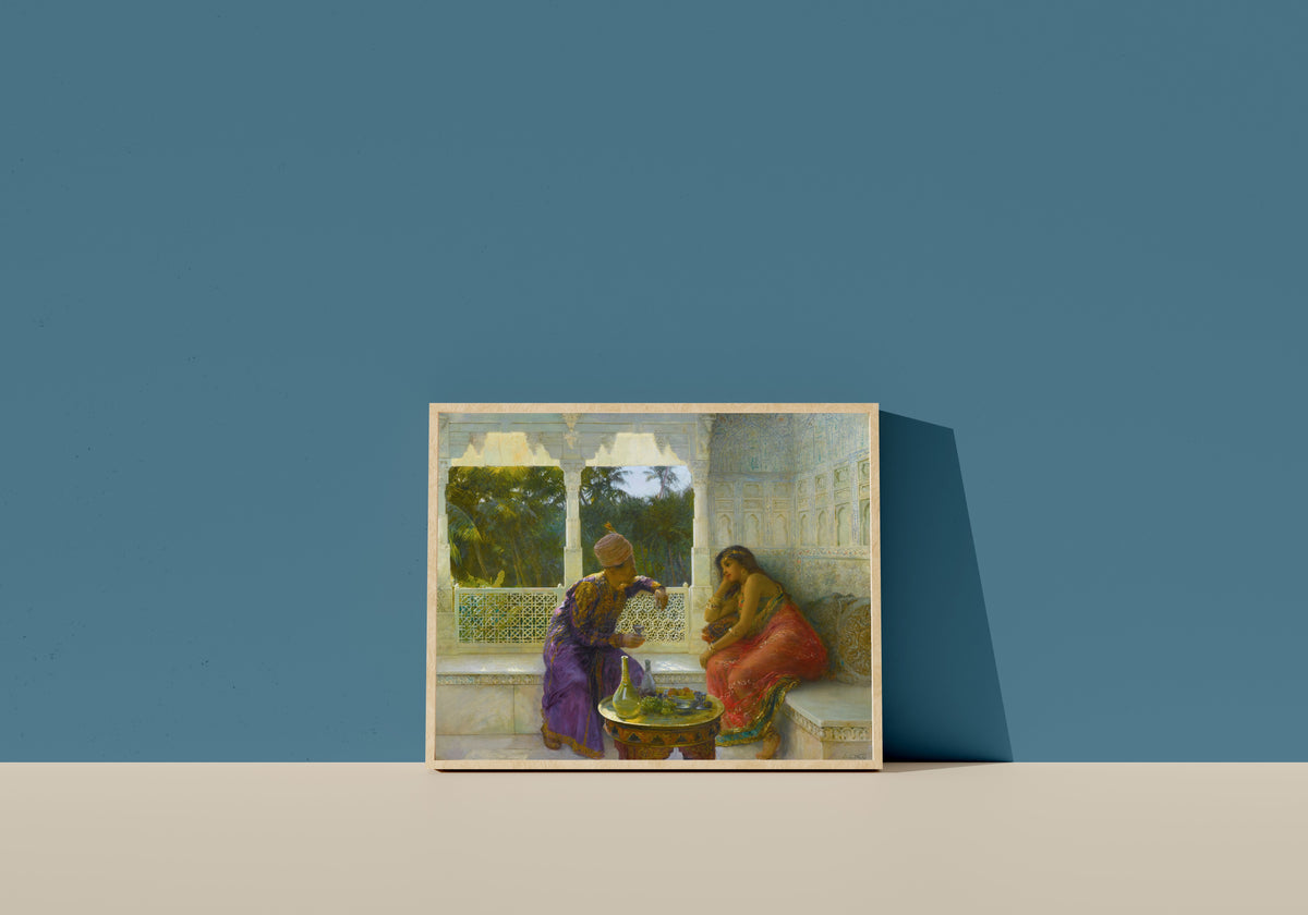 Framed art print of Figures in an Interior with Garden of Palms Beyond by Edwin Lord Weeks, in a light wood frame leaning on a blue wall