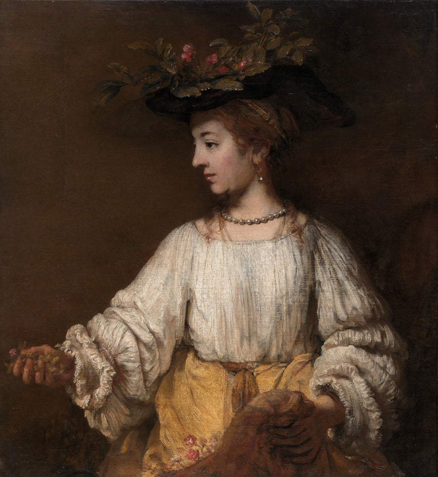 Rembrandt van Rijn — Flora | Fine Art Print shown to scale on a wall above a sofa