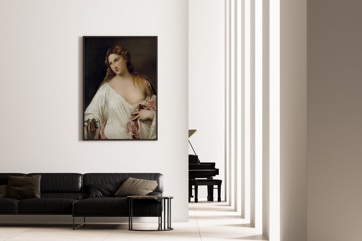 Framed art print of Flora by Titian, on the wall of a minimal living room