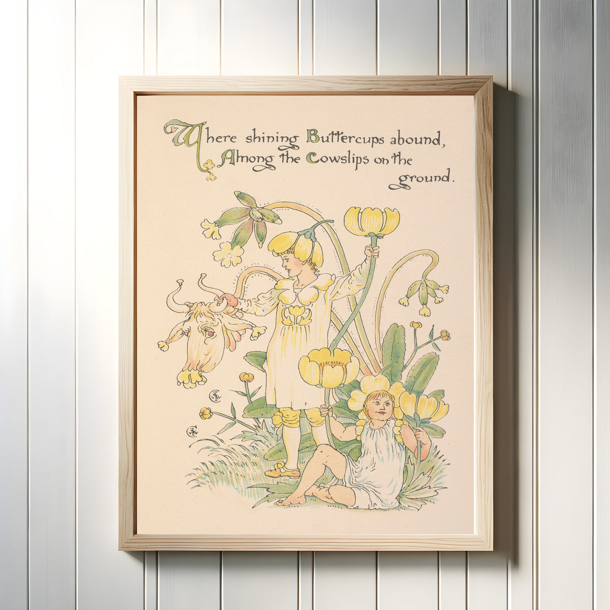 Framed art print of Flora's Feast: Buttercups by Walter Crane, in a light wood frame on a white panelled wall