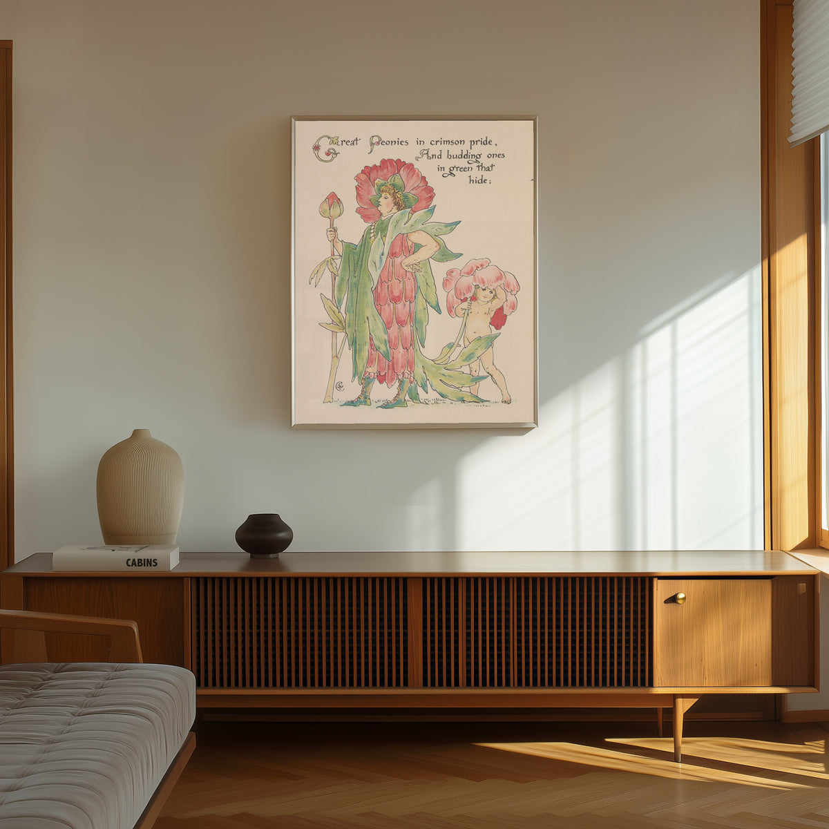 Framed art print of Flora's Feast: Peonies by Walter Crane, in a thin light frame on a sunlit wall above a wooden sideboard