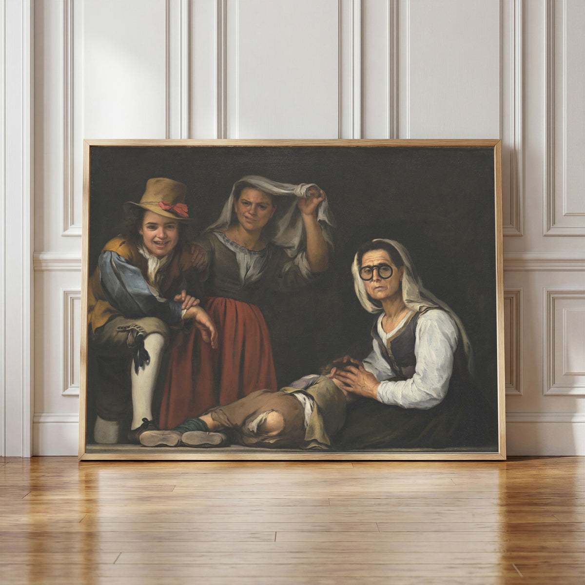 Framed art print of Four Figures on a Step by Bartolomé Esteban Murillo, in a light wood frame leaning against a panelled white wall