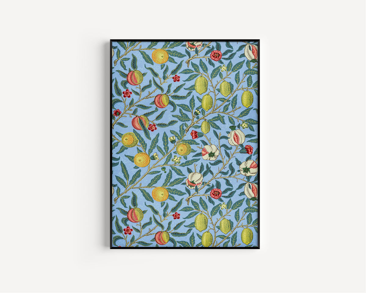 Framed art print of Four Fruits by William Morris, in a slim black frame on a plain white wall