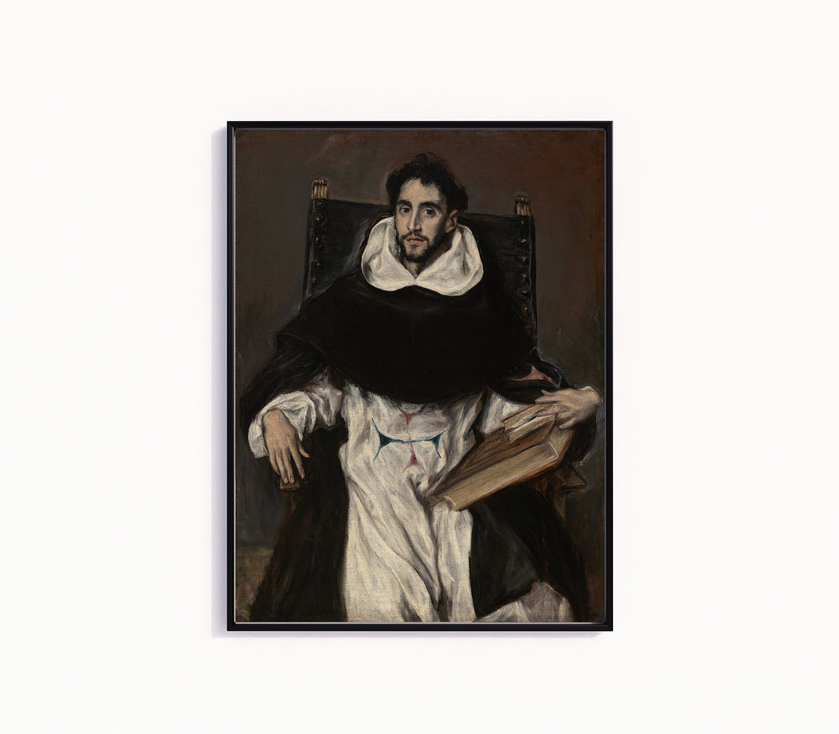 Framed art print of Fray Hortensio Félix Paravicino by El Greco, in a slim black frame on a plain white wall