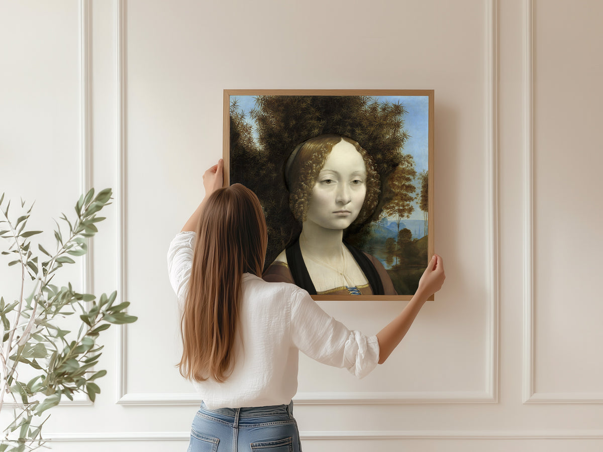 Framed art print of Ginevra de’ Benci by Leonardo da Vinci, hung on a panelled wall