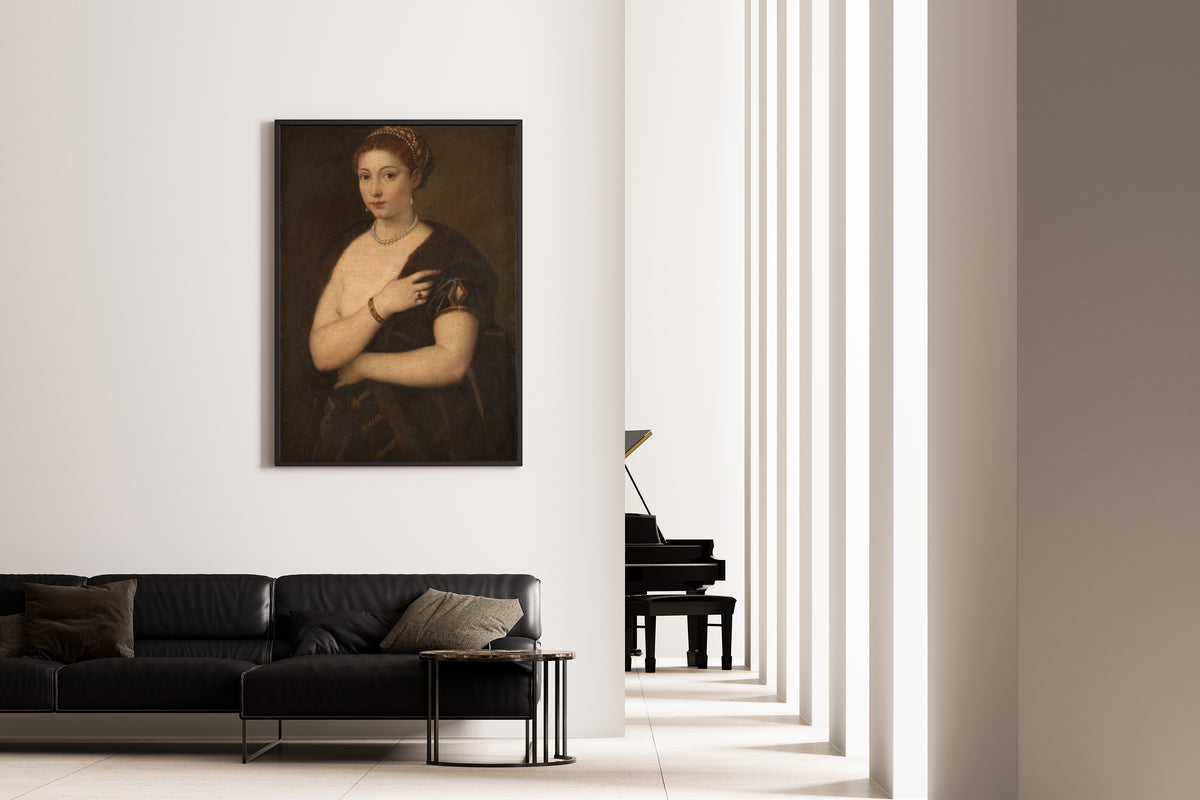 Framed art print of Girl in a Fur by Titian, on the wall of a minimal living room