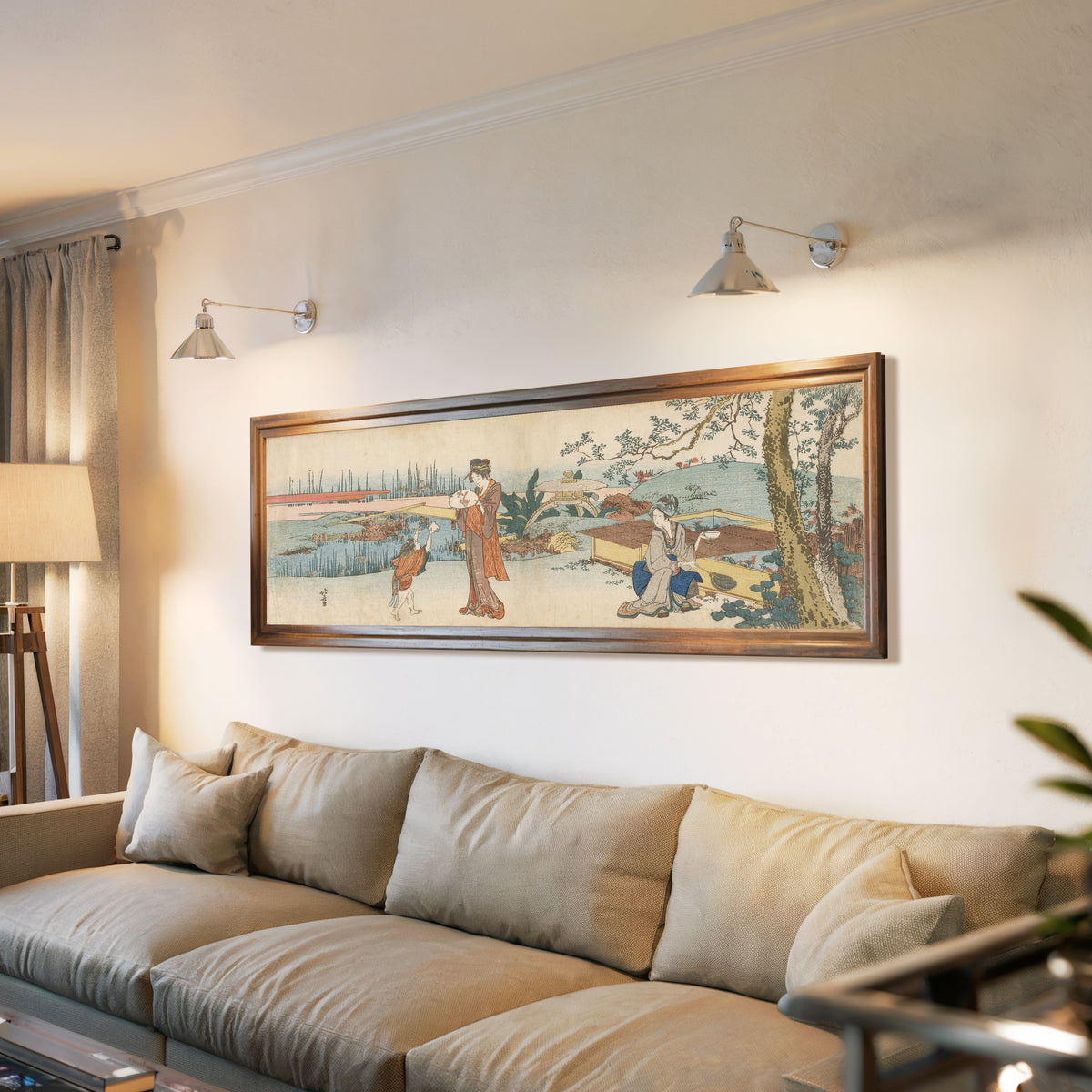 Framed art print of Goldfish Vendor by Katsushika Hokusai, above a long sofa with wall lights