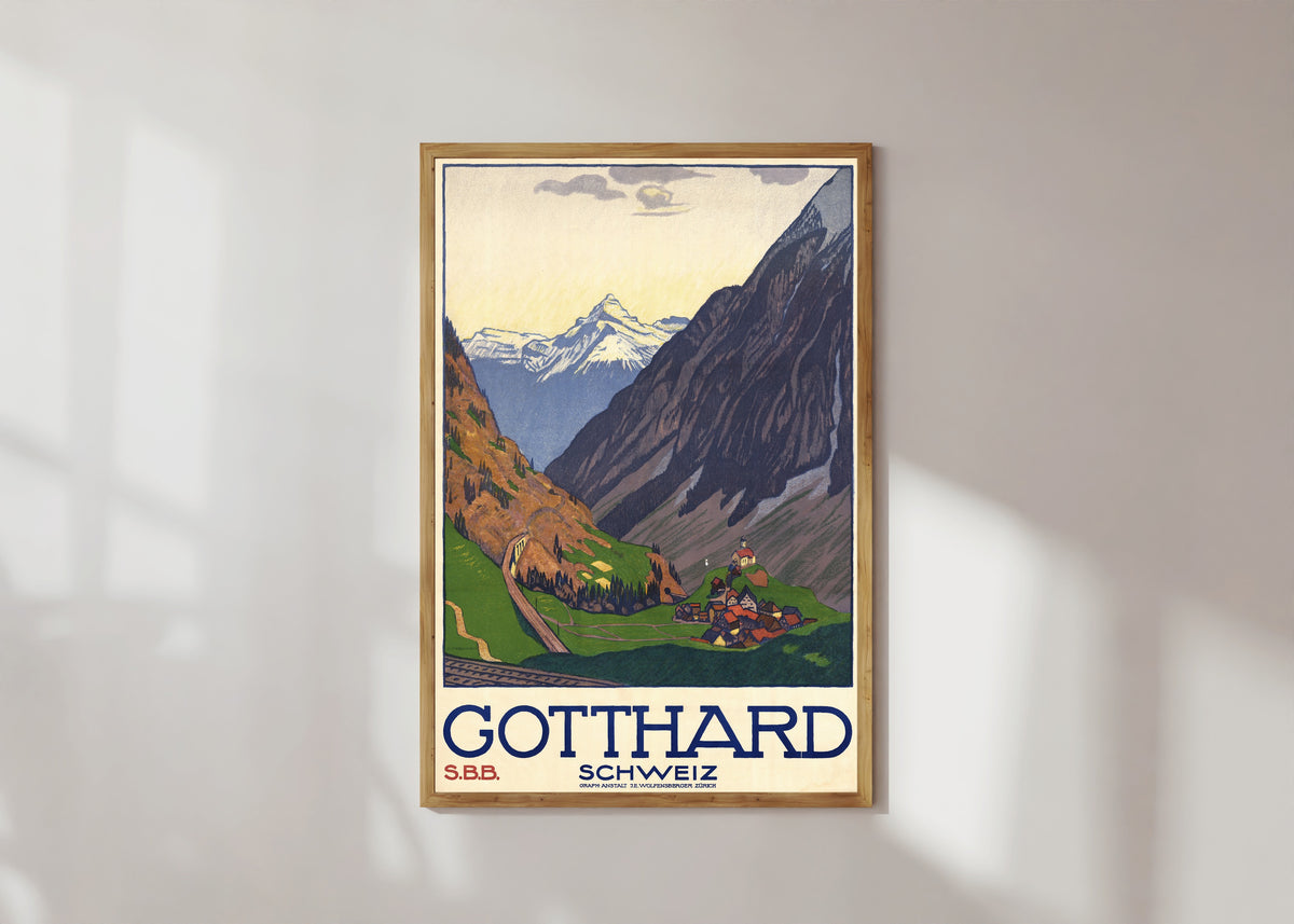 Framed art print of Gotthard Schweiz by Emil Cardinaux, in a light wood frame on a sunlit white wall