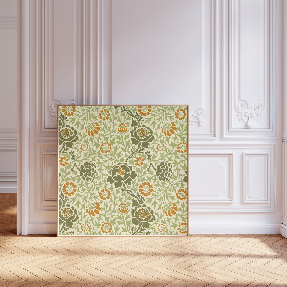 Framed art print of Grafton by William Morris, leaning against pale pink panelling on a herringbone floor
