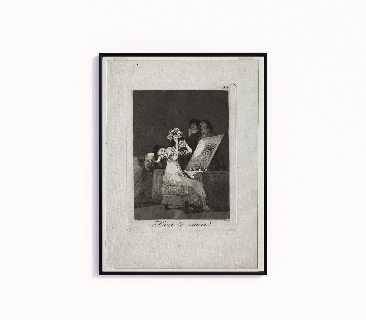 Framed art print of Hasta la muerte (Until Death), Los Caprichos, Plate 55 by Francisco de Goya, in a slim black frame on a plain white wall