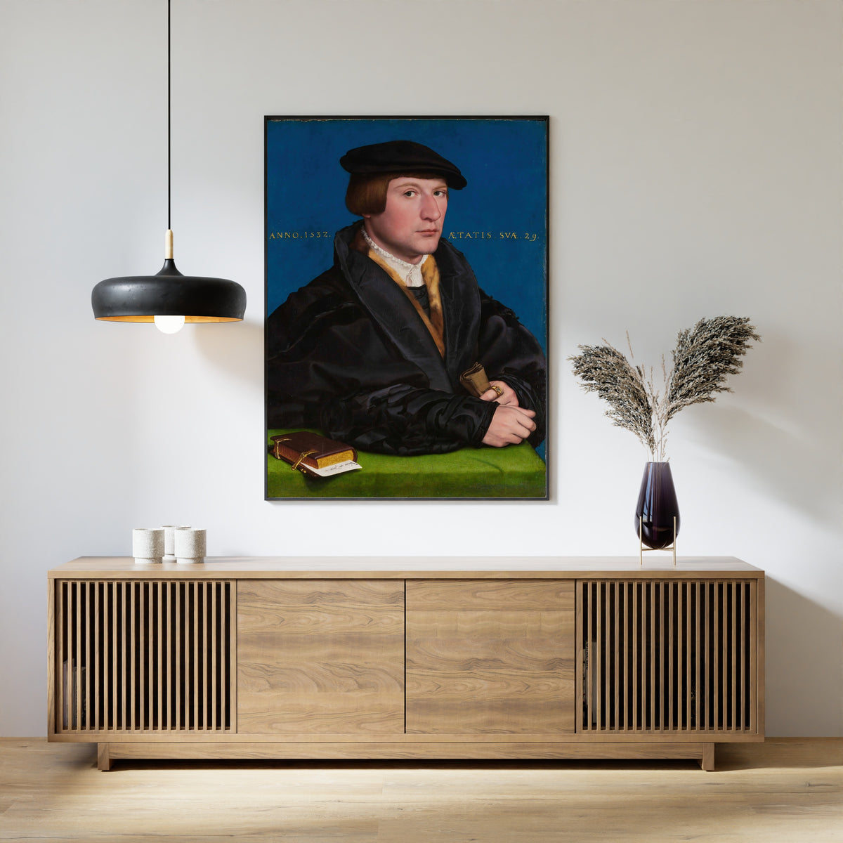Framed art print of Hermann von Wedigh III by Hans Holbein the Younger, above a slatted wood sideboard