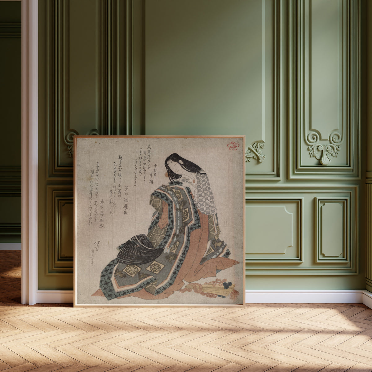 Framed art print of Hiōgi by Katsushika Hokusai, leaning against olive-green panelling on a herringbone floor