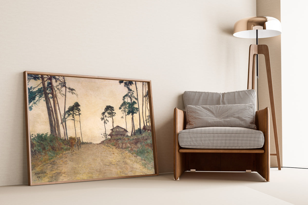 Framed art print of Highway by Hiroshi Yoshida, leaning against a wall beside an armchair and a floor lamp