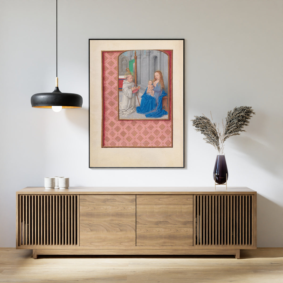 Framed art print of Hours of Queen Isabella the Catholic: Vision of Saint… by Master of the First Prayerbook of Maximilian, above a slatted wood sideboard