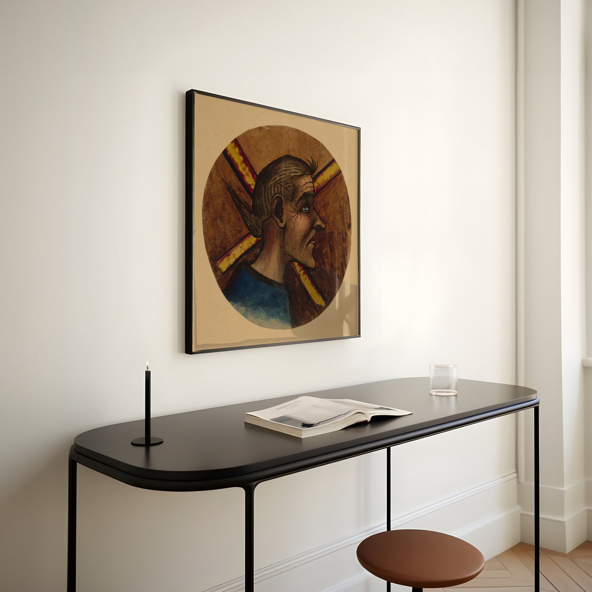 Framed art print of Hulluus by Hugo Simberg, above a slim black console table