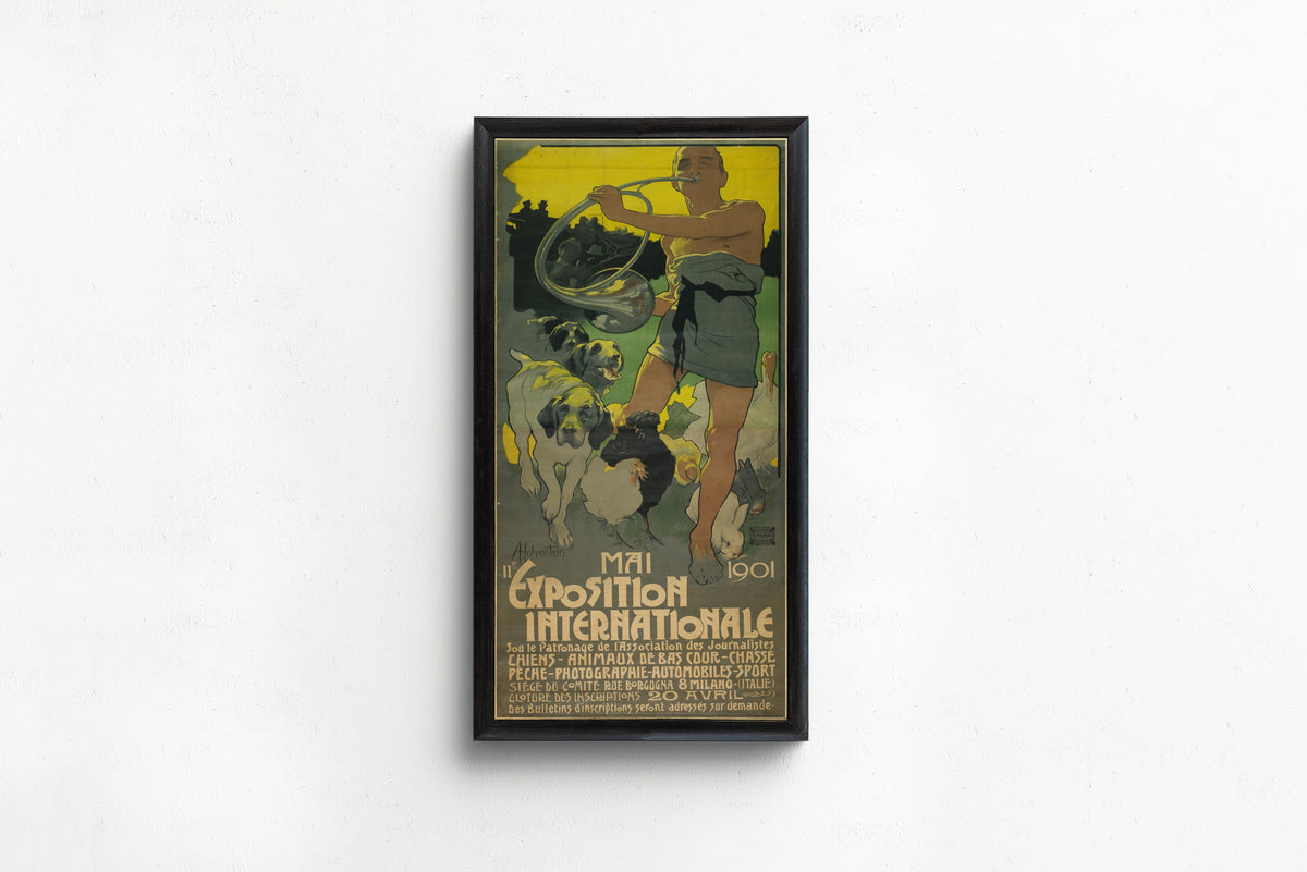 Framed art print of IIe Exposition Internationale, Mai 1901 by Adolfo Hohenstein, in a slim black frame on a plain white wall