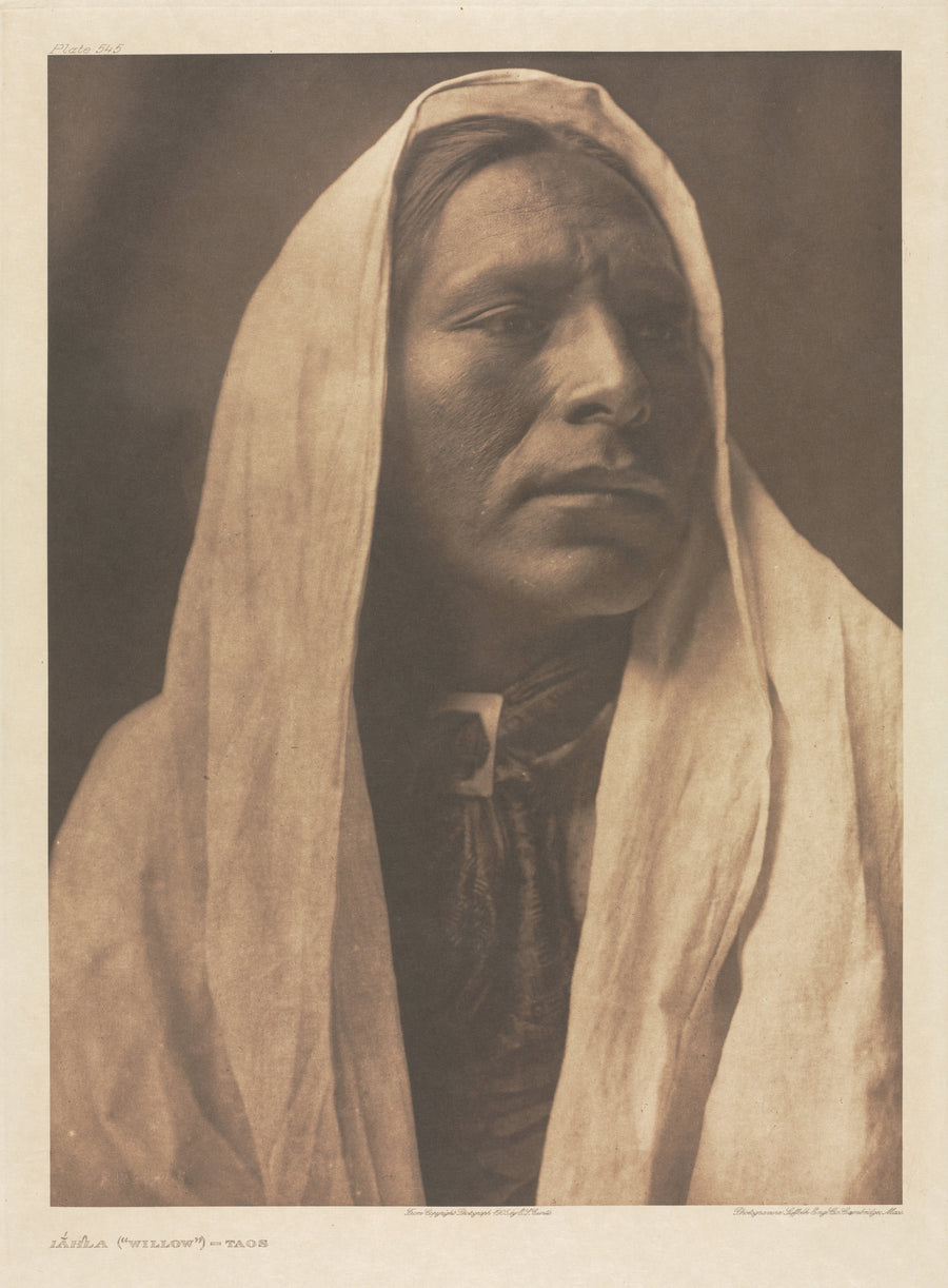 Edward S. Curtis — Iahla (Willow), Taos | Vintage Photograph Print shown to scale on a wall above a sofa