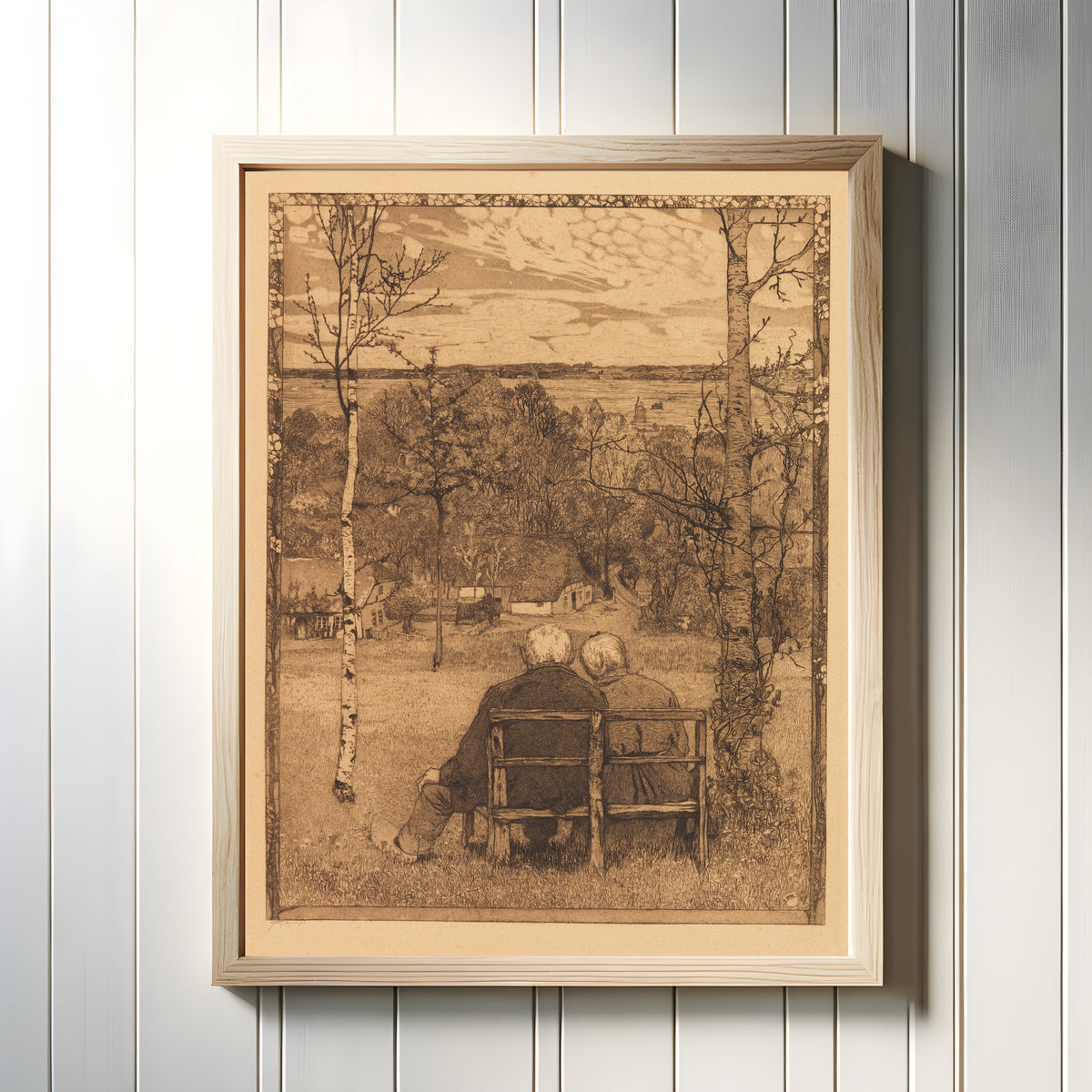 Framed art print of Im Mai by Heinrich Vogeler, in a light wood frame on a white panelled wall