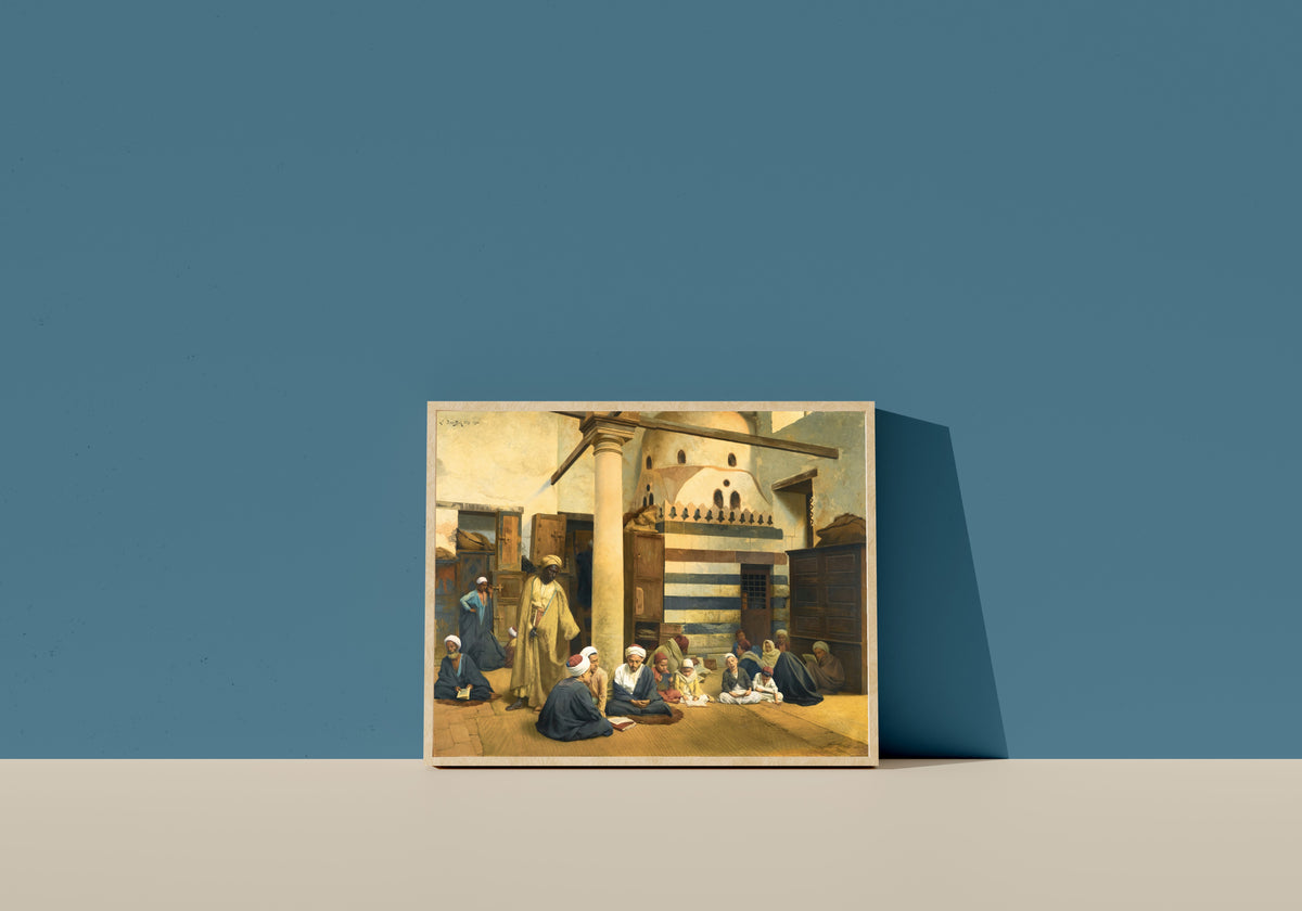 Framed art print of In the Madrasa by Ludwig Deutsch, in a light wood frame leaning on a blue wall