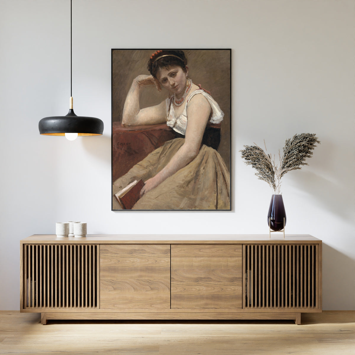 Interrupted Reading by Jean-Baptiste-Camille Corot — framed above a slatted wood sideboard