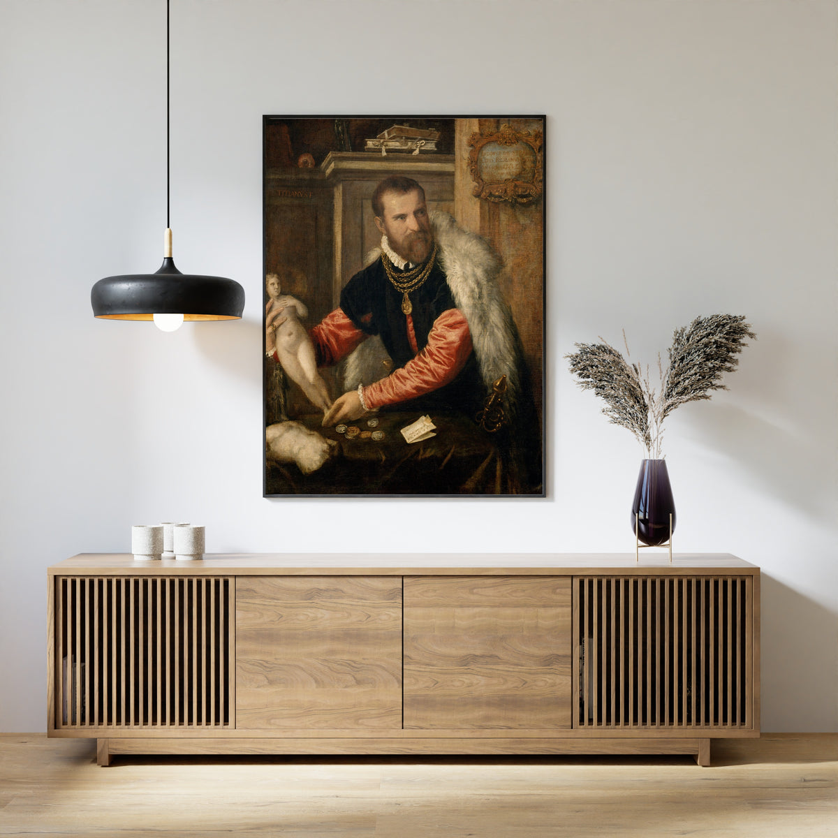 Framed art print of Jacopo Strada by Titian, above a slatted wood sideboard