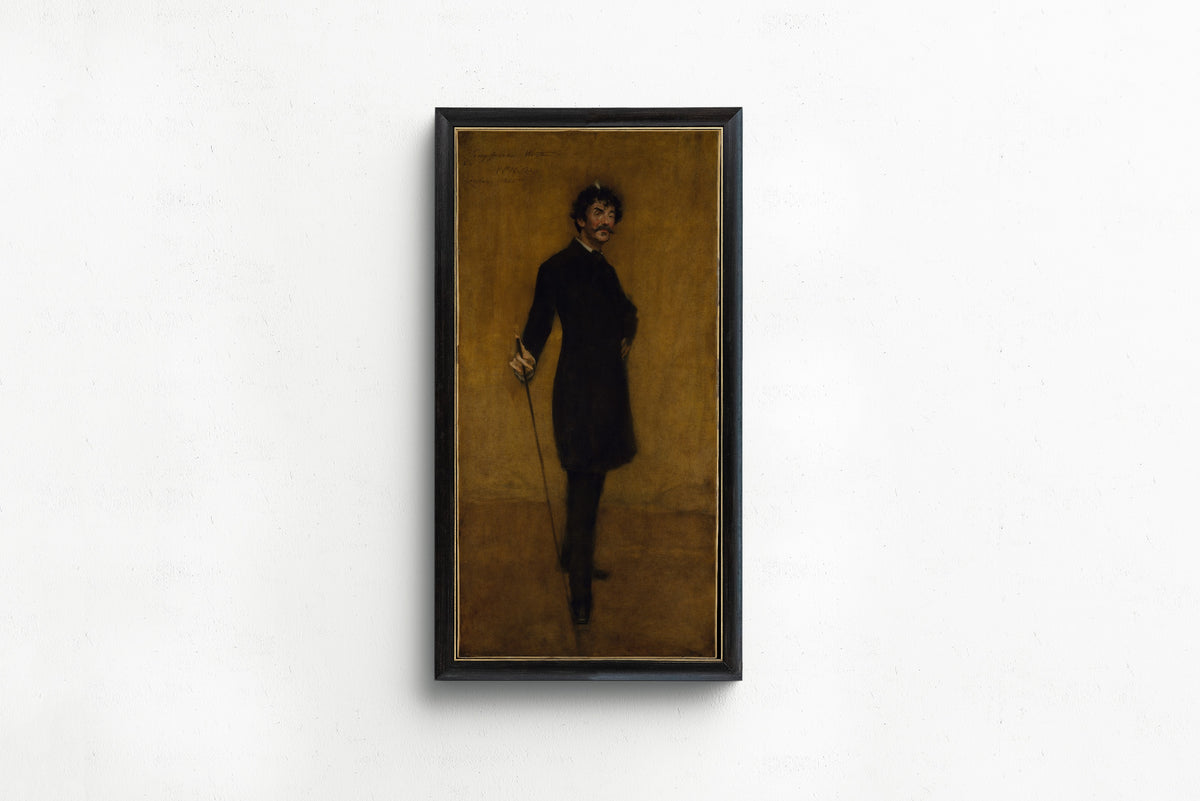 James Abbott McNeill Whistler by William Merritt Chase — in a slim black frame on a plain white wall