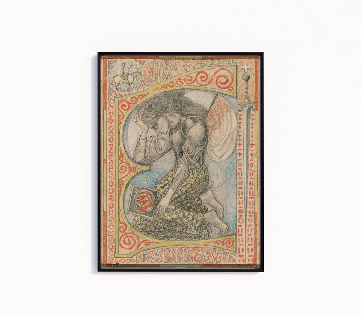 Framed art print of Joan of Arc by Jan Toorop, in a slim black frame on a plain white wall