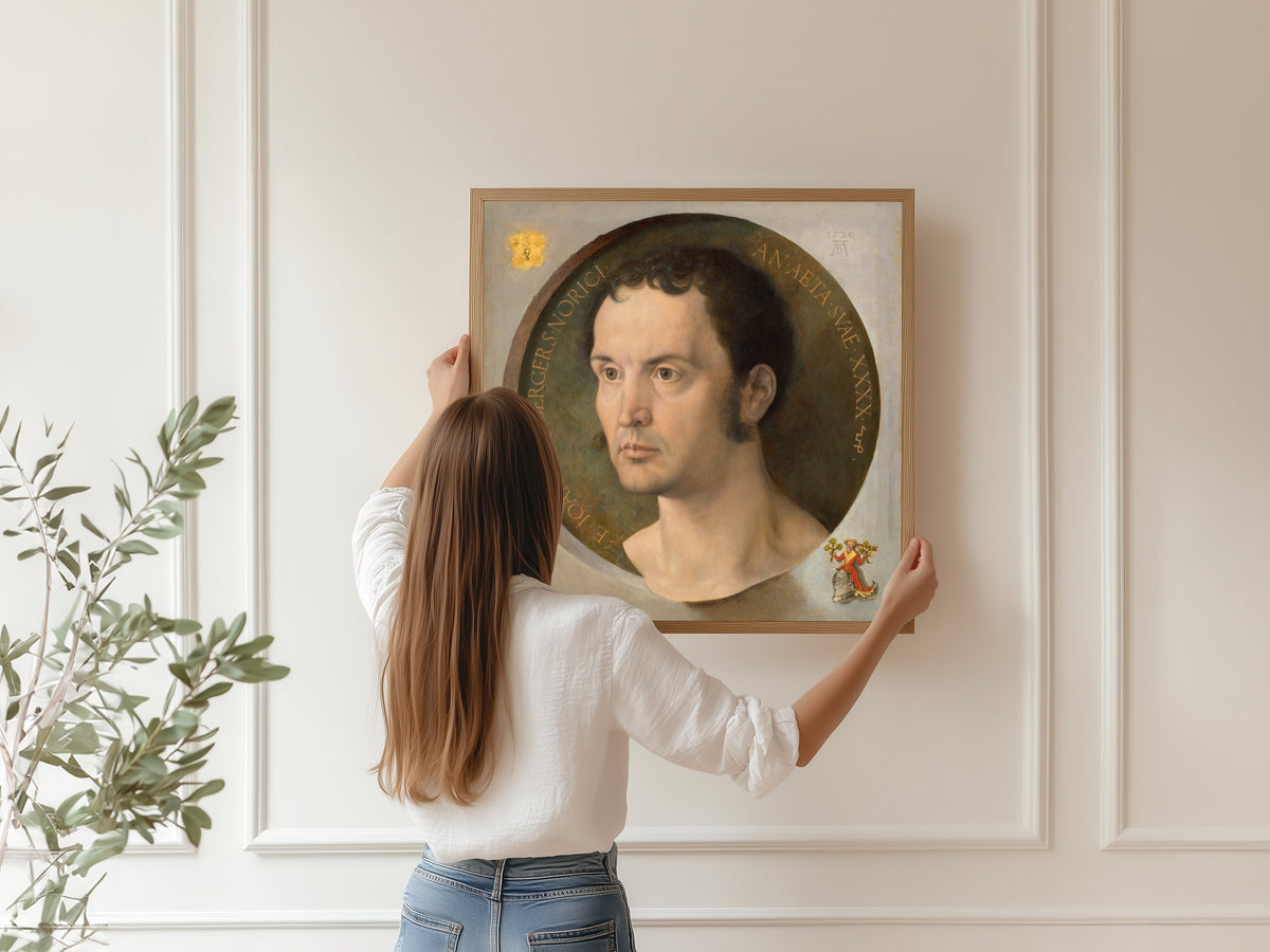 Framed art print of Johannes Kleberger by Albrecht Dürer, hung on a panelled wall