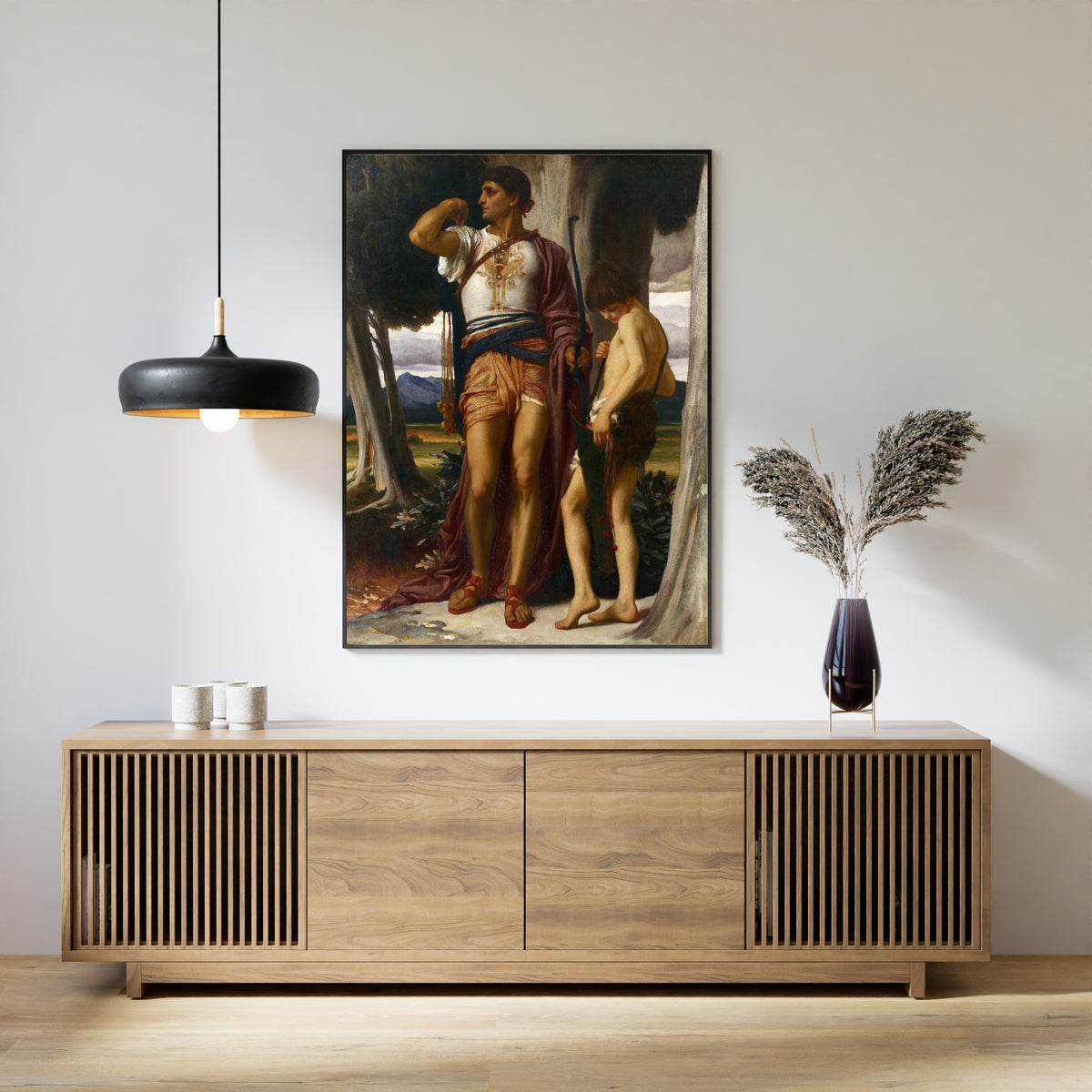 Framed art print of Jonathan's Token to David by Frederic Leighton, above a slatted wood sideboard