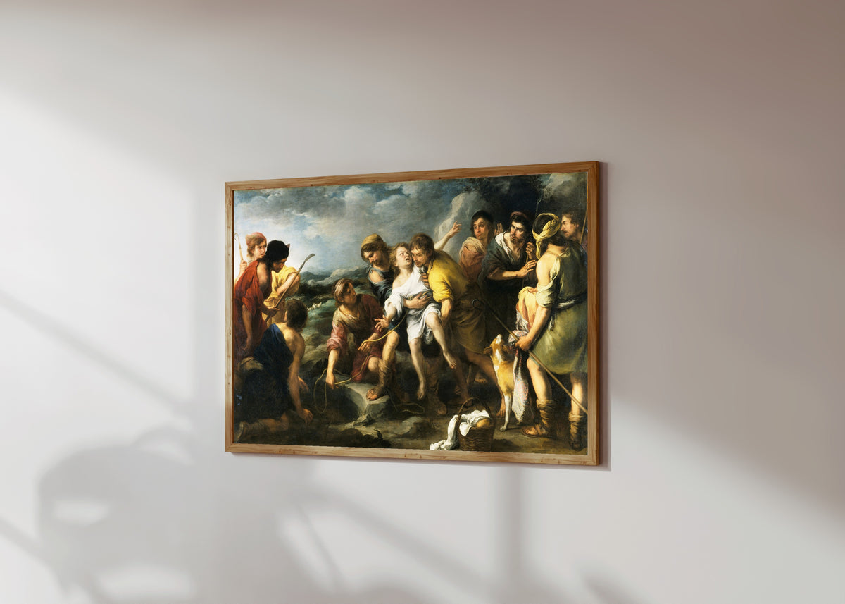 Framed art print of Joseph and his Brethren by Bartolomé Esteban Murillo, in a light wood frame on a sunlit white wall, seen at a slight angle