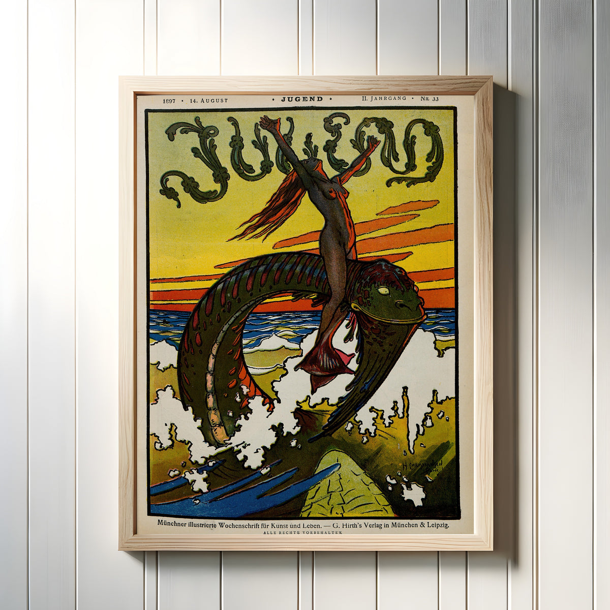Framed art print of Jugend, No. 33 by Hans Christiansen, in a light wood frame on a white panelled wall