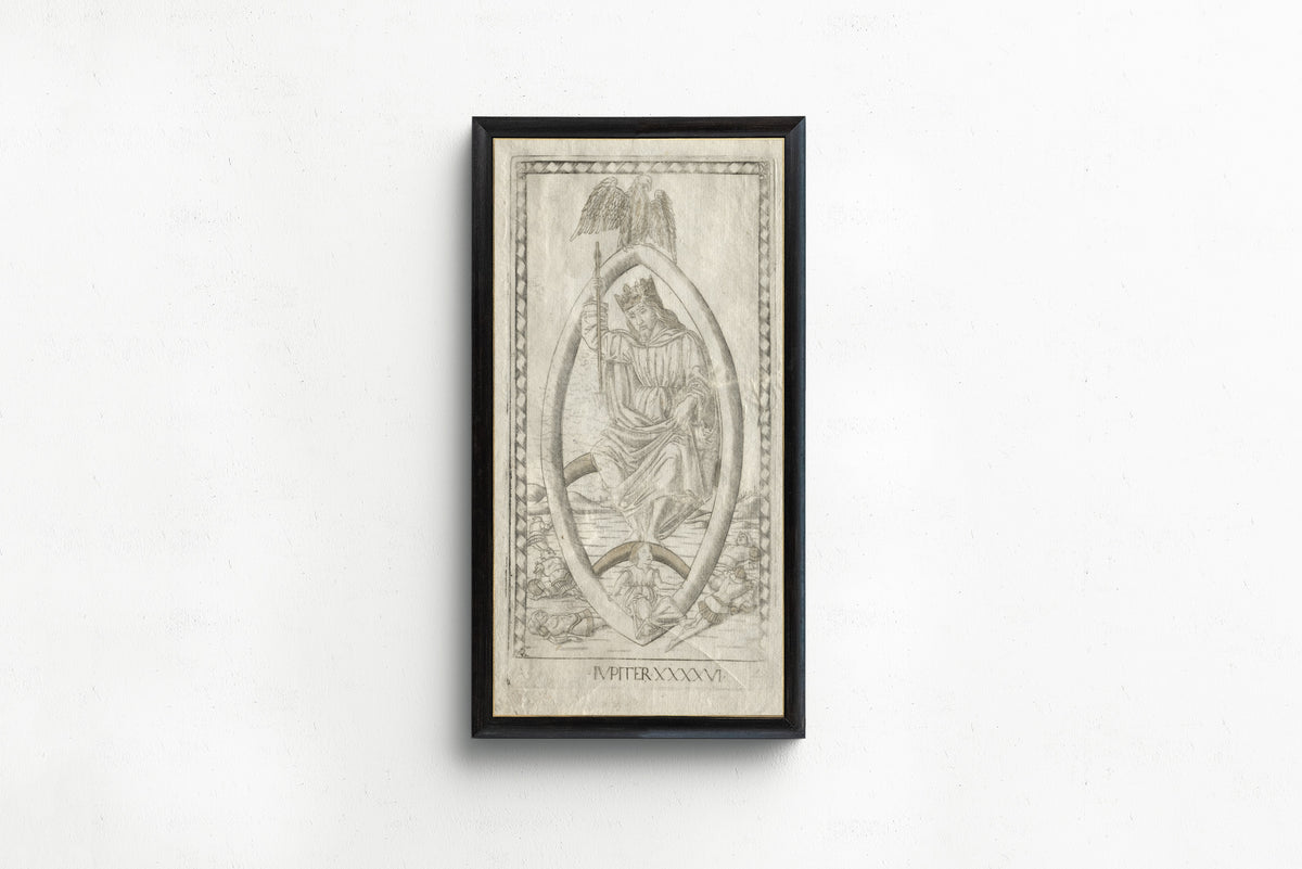 Framed art print of Jupiter (from the Tarocchi, Series A: Firmaments of the… by Master of the E-Series Tarocchi, in a slim black frame on a plain white wall