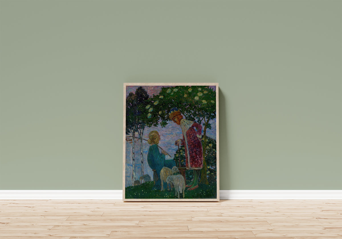 Framed art print of König und Schäferin by Heinrich Vogeler, in a light wood frame leaning on a sage green wall above a wooden floor