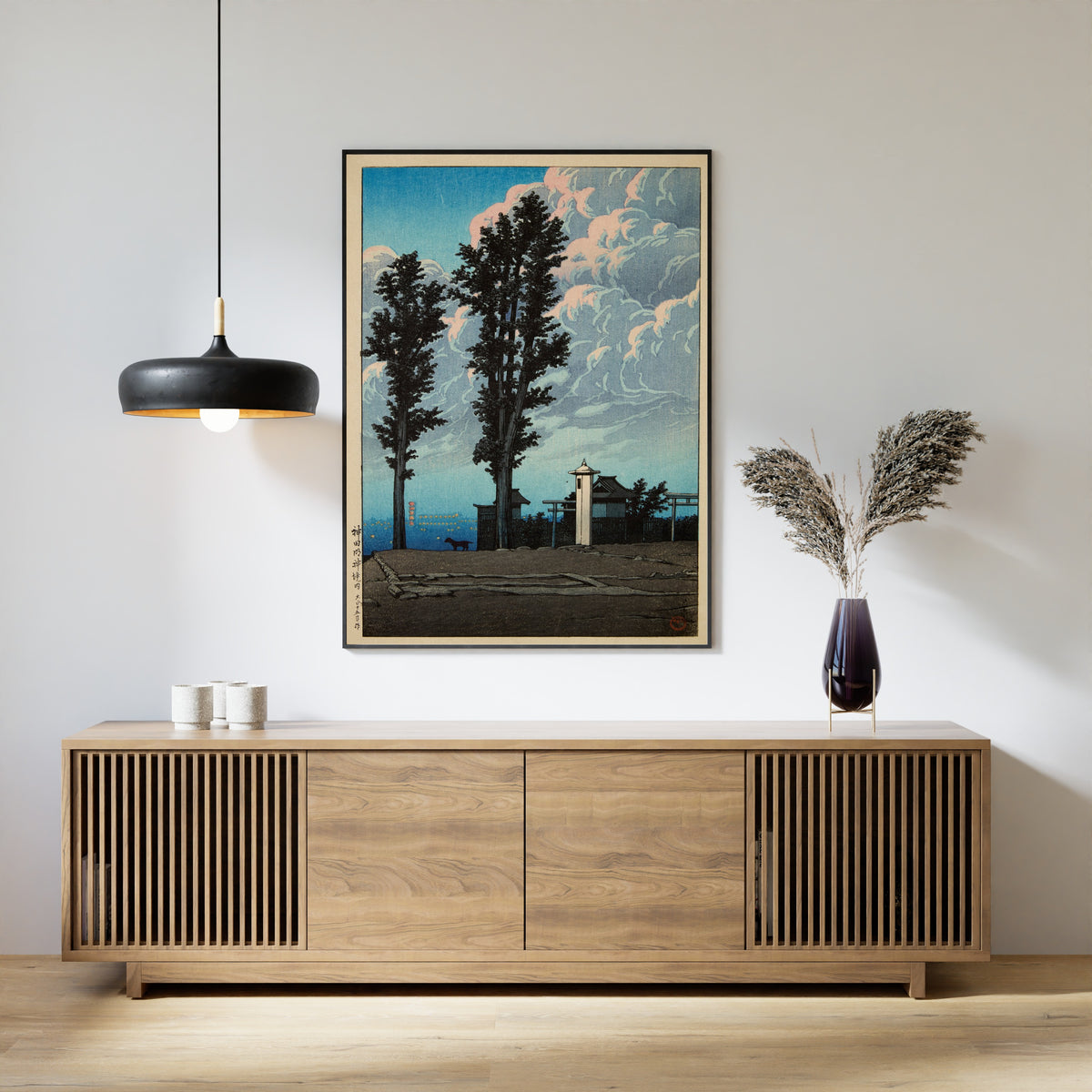 Framed art print of Kanda Myojin Shrine Precinct by Kawase Hasui, above a slatted wood sideboard