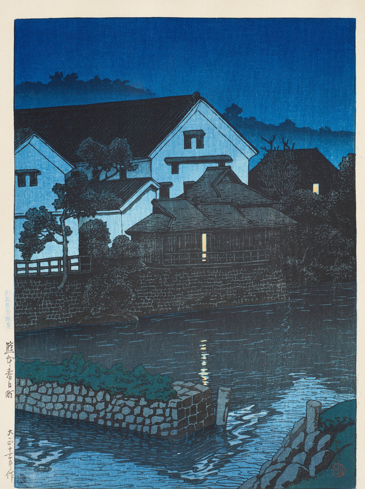 Kasuga-cho, Kumamoto by Kawase Hasui — Lit windows and a rippling river below pale walls in deep blue
