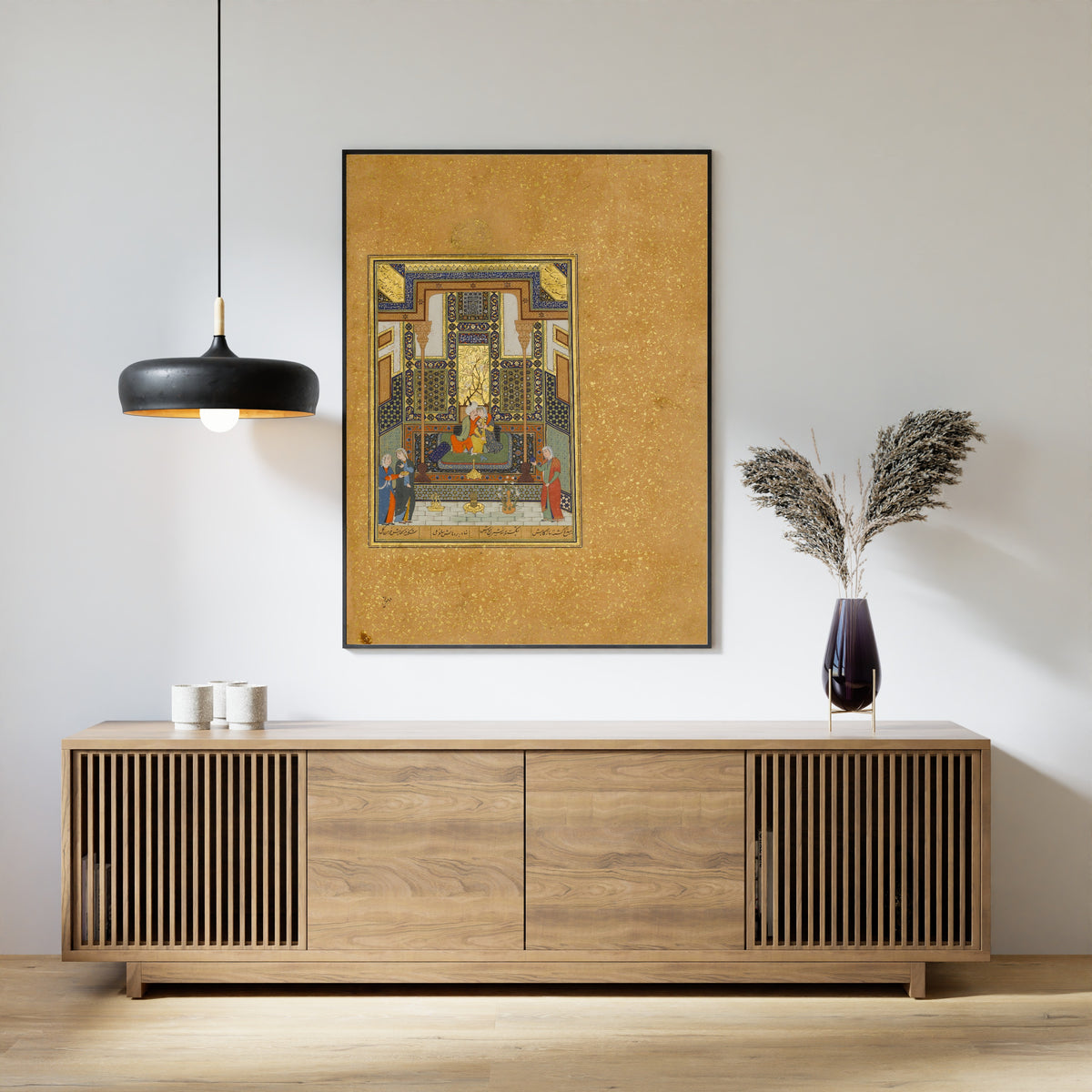 Framed art print of Khamsa of Nizami: Marriage of Khusrau and Shirin by Shaikh Zada, above a slatted wood sideboard
