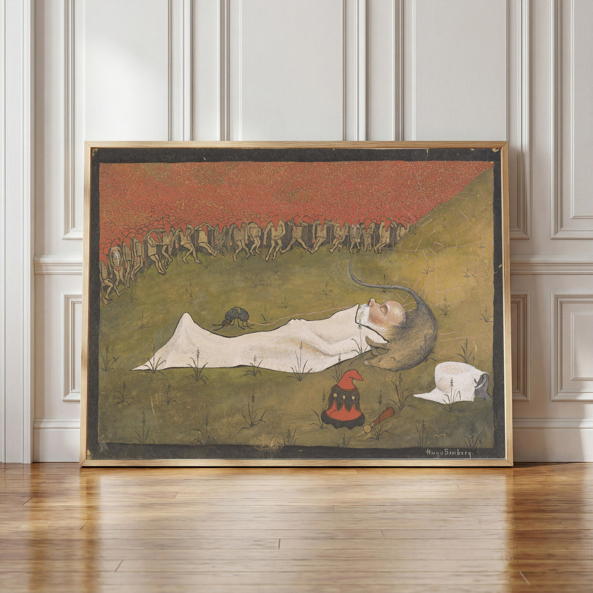 Framed art print of King Hobgoblin Sleeping by Hugo Simberg, in a light wood frame leaning against a panelled white wall
