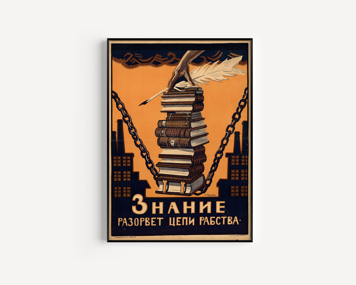 Framed art print of Knowledge Will Break the Chains of Slavery by Aleksei Radakov, in a slim black frame on a plain white wall