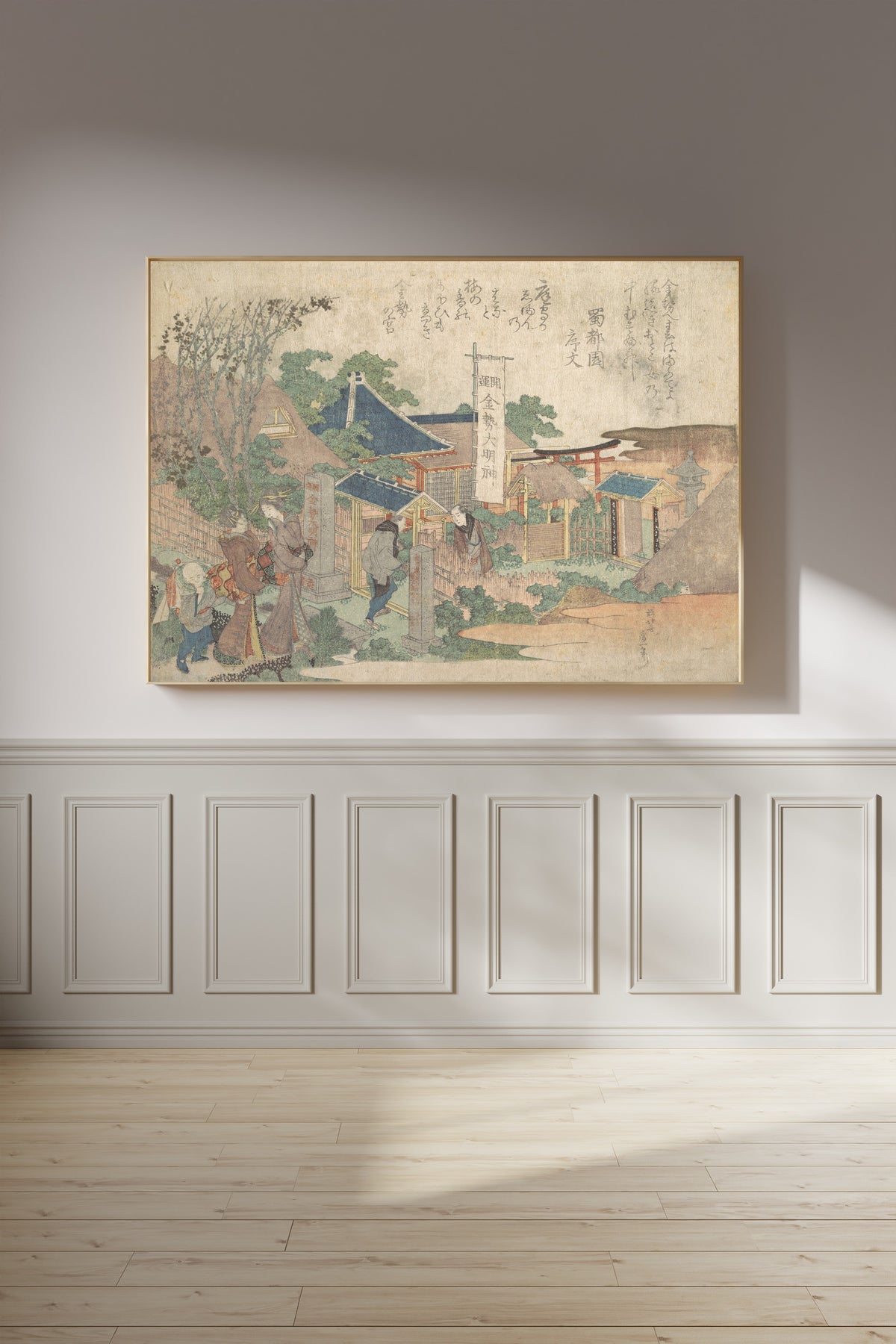 Framed art print of Konsei Daimyōjin Shrine by Katsushika Hokusai, on a panelled wall in afternoon light
